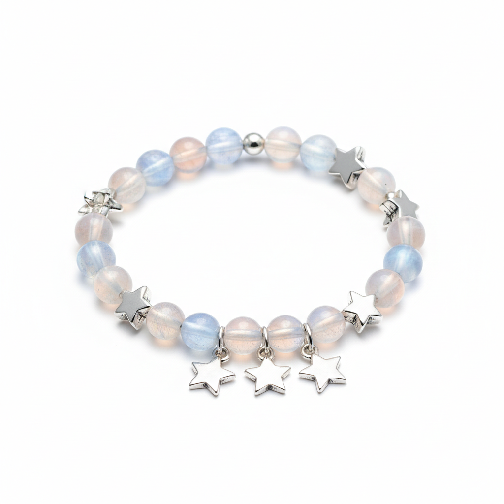 Delicate elastic bracelet with silver star charms and moonstone beads for girls, jewellery product photo, clean white background, close-up square format.
